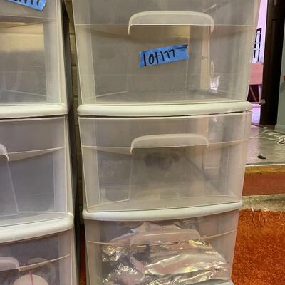 lot 177- (2) small rolling cabinets with contents 