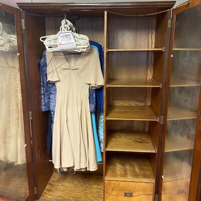 lot 180- mid century modern wood wardrobe cabinet with contents (41 in. wide, 68 in. tall, 19 in. long)
