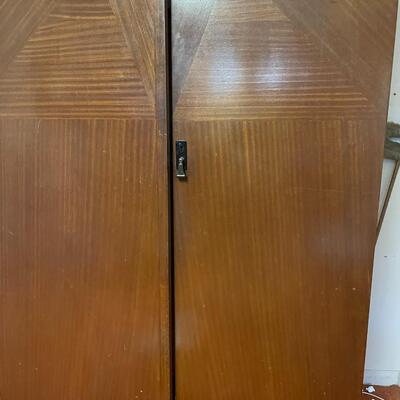 lot 180- mid century modern wood wardrobe cabinet with contents (41 in. wide, 68 in. tall, 19 in. long)