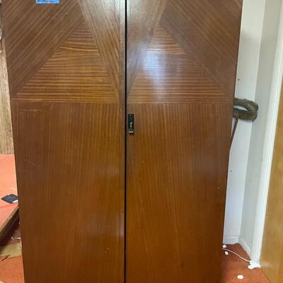 lot 180- mid century modern wood wardrobe cabinet with contents (41 in. wide, 68 in. tall, 19 in. long)