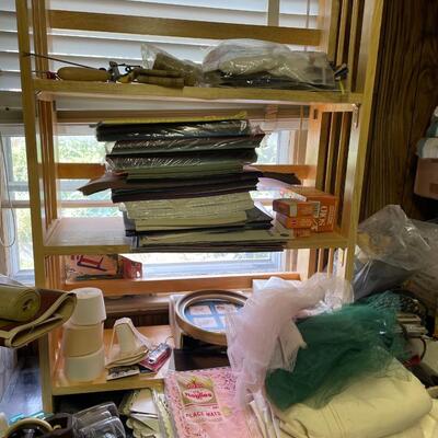 lot 182- Entire contents of crafting room including all crafts, furniture, Sears kenmore sewing machine table, (2) dressers, Shelves, (2)...