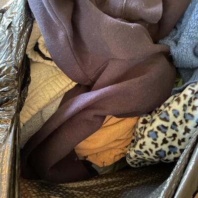 lot 190- (2) large bags with misc. clothes and blankets