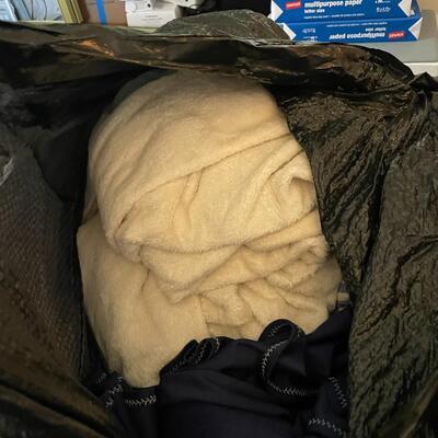 lot 190- (2) large bags with misc. clothes and blankets