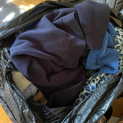 lot 190- (2) large bags with misc. clothes and blankets