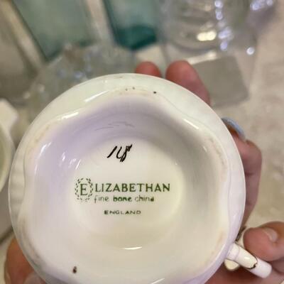 lot 194- Misc. glassware, corning ware, england fine china teacup set, vase
