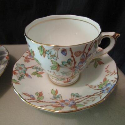 Group of Seven Fine Bone China Cups and Saucers- Assorted Makers (One is a Mustache Cup)