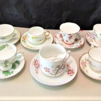 Group of Seven Fine Bone China Cups and Saucers- Assorted Makers (One is a Mustache Cup)