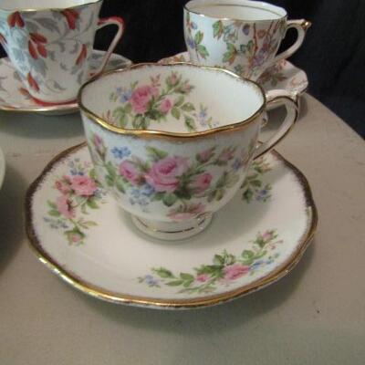 Group of Seven Fine Bone China Cups and Saucers- Assorted Makers (One is a Mustache Cup)