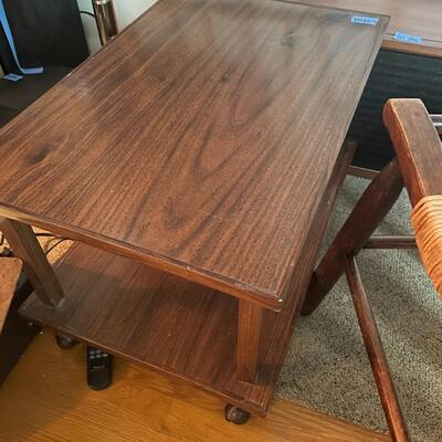 lot 207- Mid century modern rolling table and small stool