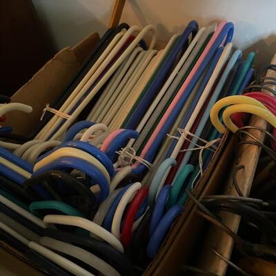lot 214- (2) boxes full of hangers
