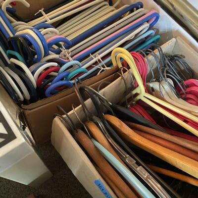 lot 214- (2) boxes full of hangers