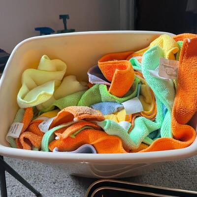 lot 227- magazine rack, set of (3) trays, box of microfiber rags