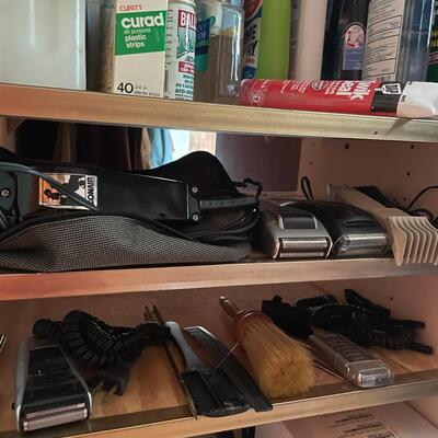 lot 232- shelves of misc. toiletries, clippers, chemicals, etc.
