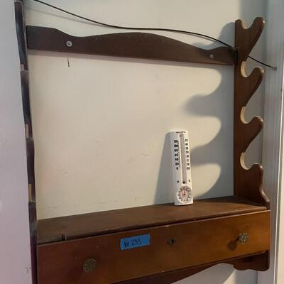lot 233- hanging wooden wall shelf (must remove yourself), acurite