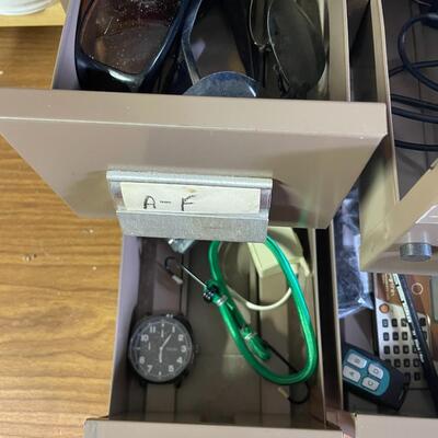 lot 240- filing box with contents, box of misc. cords