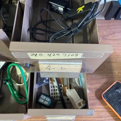lot 240- filing box with contents, box of misc. cords
