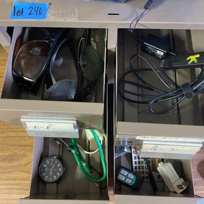 lot 240- filing box with contents, box of misc. cords