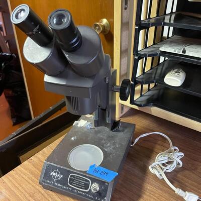 lot 244- Swift international stereo eighty microscope