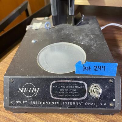lot 244- Swift international stereo eighty microscope