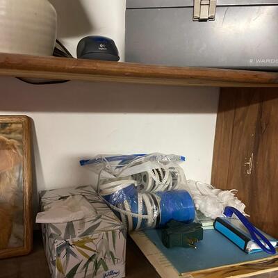 lot 249- shelves of items, books, cassettes, tools, lamps, videos circa 1950's, dell speakers, box, etc.