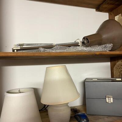 lot 249- shelves of items, books, cassettes, tools, lamps, videos circa 1950's, dell speakers, box, etc.