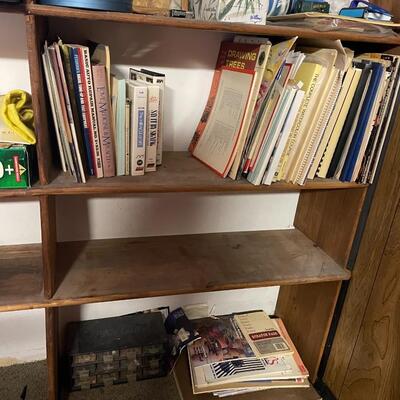 lot 249- shelves of items, books, cassettes, tools, lamps, videos circa 1950's, dell speakers, box, etc.