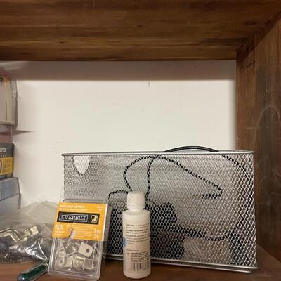 lot 249- shelves of items, books, cassettes, tools, lamps, videos circa 1950's, dell speakers, box, etc.