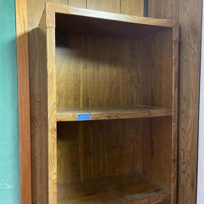 lot 258- tall bookshelf with contents
