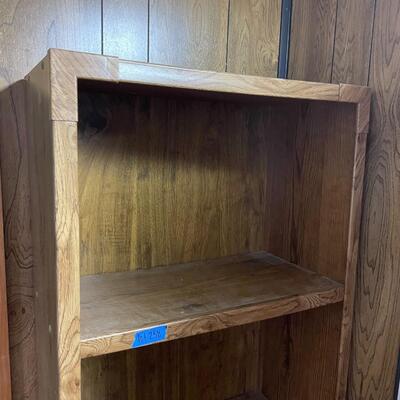 lot 258- tall bookshelf with contents