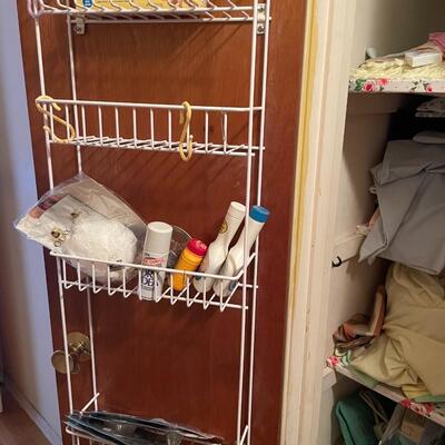 lot 265- closet with all contents linens, toiletries, vacuum, etc.