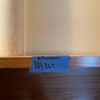 lot 267- Shelf with contents, batteries, massager, books, puzzles, pocket knife, etc.