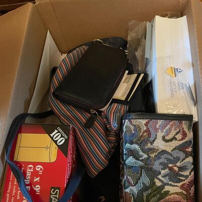 Lot 273- Box of misc. bags, wallets, and office supplies
