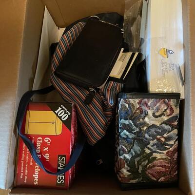 Lot 273- Box of misc. bags, wallets, and office supplies