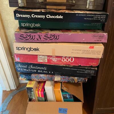 Lot 276- Box full of vintage games.