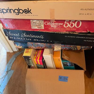 Lot 276- Box full of vintage games.