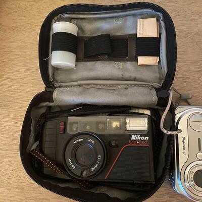 Lots 282- Vintage Nikon Camera and Samsung Camera
