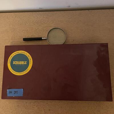 Lot 283- Vintage scrabble game and magnifying glass