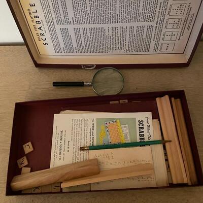 Lot 283- Vintage scrabble game and magnifying glass