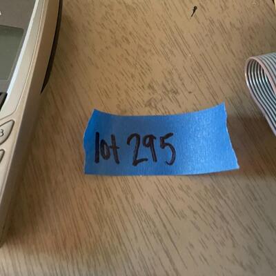lot 295- TRS-80 buffs, digitizing pen, binders, cassettes, vintage phone, lamp, trashcan, etc.