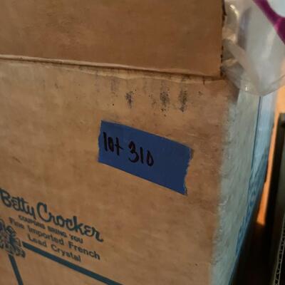 lot 310- salt and pepper shakers, cake decorating items, toys, etc.