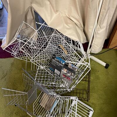 lot 328- Misc. racks, (6) shelves with misc. books and contents