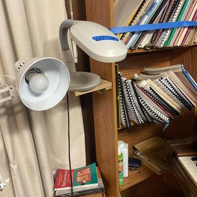 lot 328- Misc. racks, (6) shelves with misc. books and contents