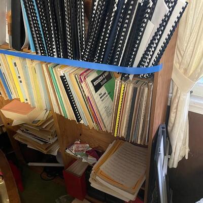 lot 328- Misc. racks, (6) shelves with misc. books and contents