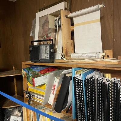 lot 328- Misc. racks, (6) shelves with misc. books and contents
