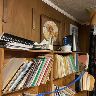 lot 328- Misc. racks, (6) shelves with misc. books and contents