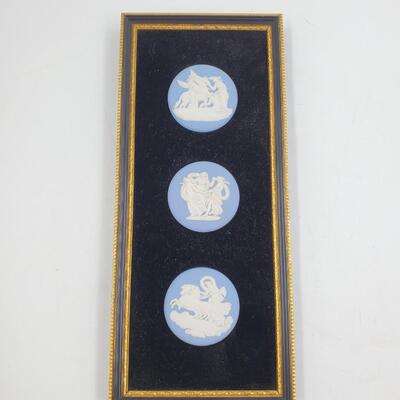 WEDGEWOOD BLUE AND WHITE CAMEO MEDALLIONS ENCASED IN A FRAME/PLAQUE 