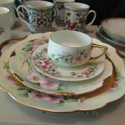 Assorted Fine Bone China by Various Makers- Includes Cups, Plates, Pitcher, and Salt Cellars
