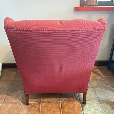 RED UPHOLSTERED ARMCHAIR