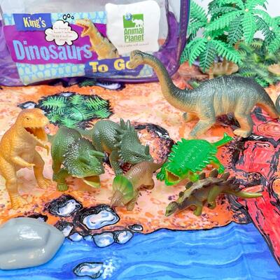 ANIMAL PLANET â€œDINOSAURS TO GOâ€ PLASTIC DINOSAURS & MAT IN BACKPACK