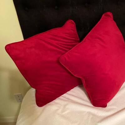 Lot 49  Pair of red velvet pillows